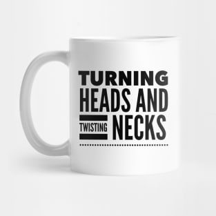 Turning heads and twisting necks Mug